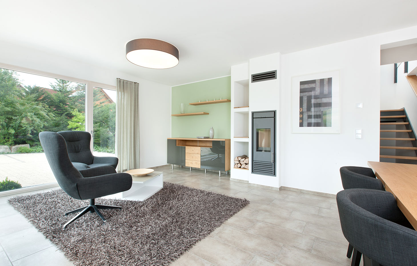 Musterhaus – Weissach im Tal-wohnzimmer-mit-ofen