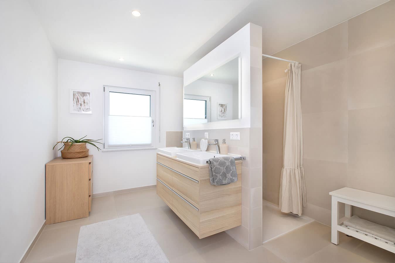 Modernes-effizienzhaus-mit-flachdach-badezimmer-waschbecken-fertighaus